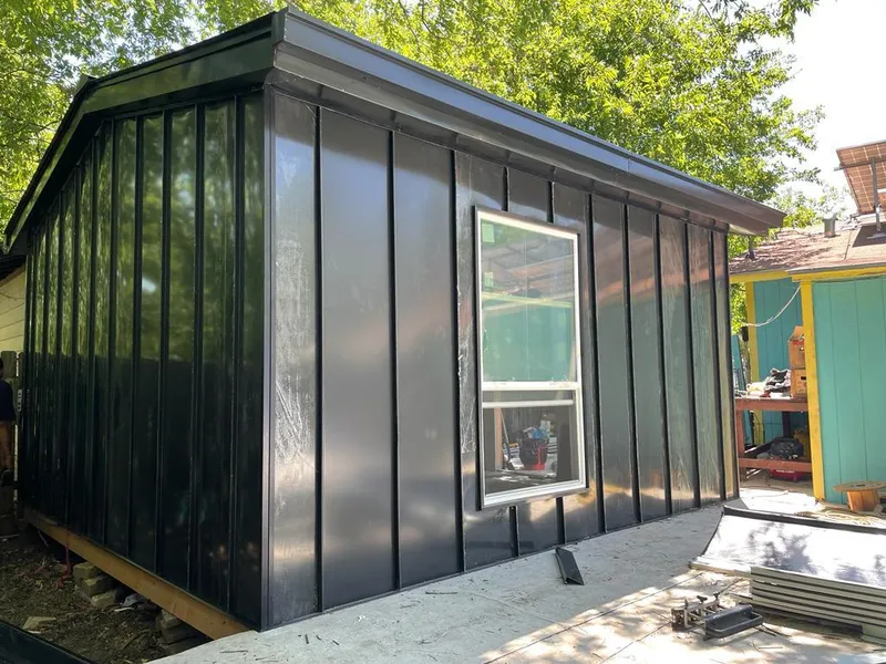 Black standing seam metal wall panels for Roof Inspection in Richfield